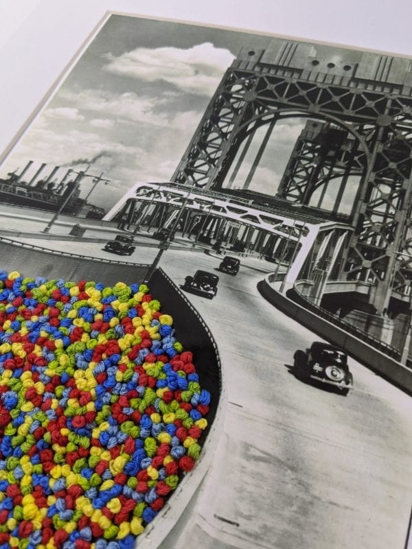 Embroidery art on black and white photo of cars on bridge, French knot ball pit