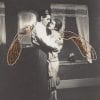Embroidery Art, threaded helicopter wings on old black and white photo