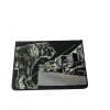 Embroidery art on small black notebook, collage of tiger entering city street