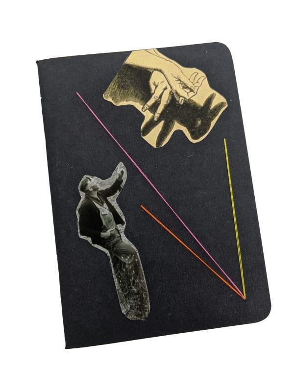 Embroidery art on small black notebook, collage of man pointing to sky with rabbit shadow puppet