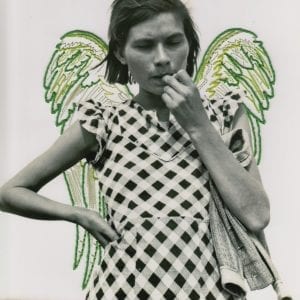 Embroidery Art, threaded green angel wings on young woman in old black and white photo by Dorothea Lange