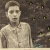 Embroidery Art, threaded fireflies and Mason jar on black and white photo of little boy