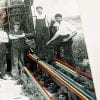 Embroidery Art, threaded lines on rails of old black and white photo of train