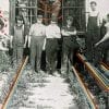 Embroidery Art, threaded lines on rails of old black and white photo of train