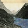 Embroidery Art, neon green purple and blue threaded river between mountains black and white photo