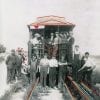 Embroidery Art, threaded lines on rails of old black and white photo of train