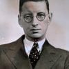 Embroidery art on black and white photo, threaded hot pink pocket and details on portrait of man in glasses