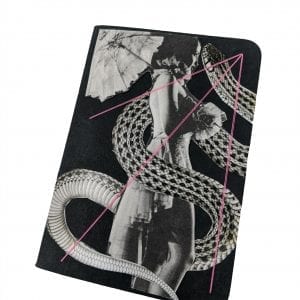 Pocket size black notebook with collage of woman with parasol being seduced by a giant snake