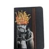 Pocket size black notebook with collage of photos and thread